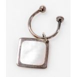 A Douglas Pell silver and mother of pearl keyring, boxed, London 2005.