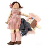 An early 20thC bisque headed doll, with blue sleep eyes, and articulated composite limbs, 43cm.