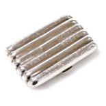 A George V silver cigarette case, the body of ribbed form decorated with bright cut bamboo shoot and
