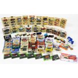 Matchbox, Lledo, Hachette and other diecast vintage commercial trucks, horse drawn wagons, tractors,