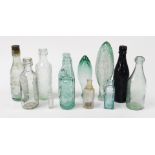 A group of glass bottles, for Barlow & Fogg Bolton, Cottam & Sons Sheffield, J Schweppes & Co London