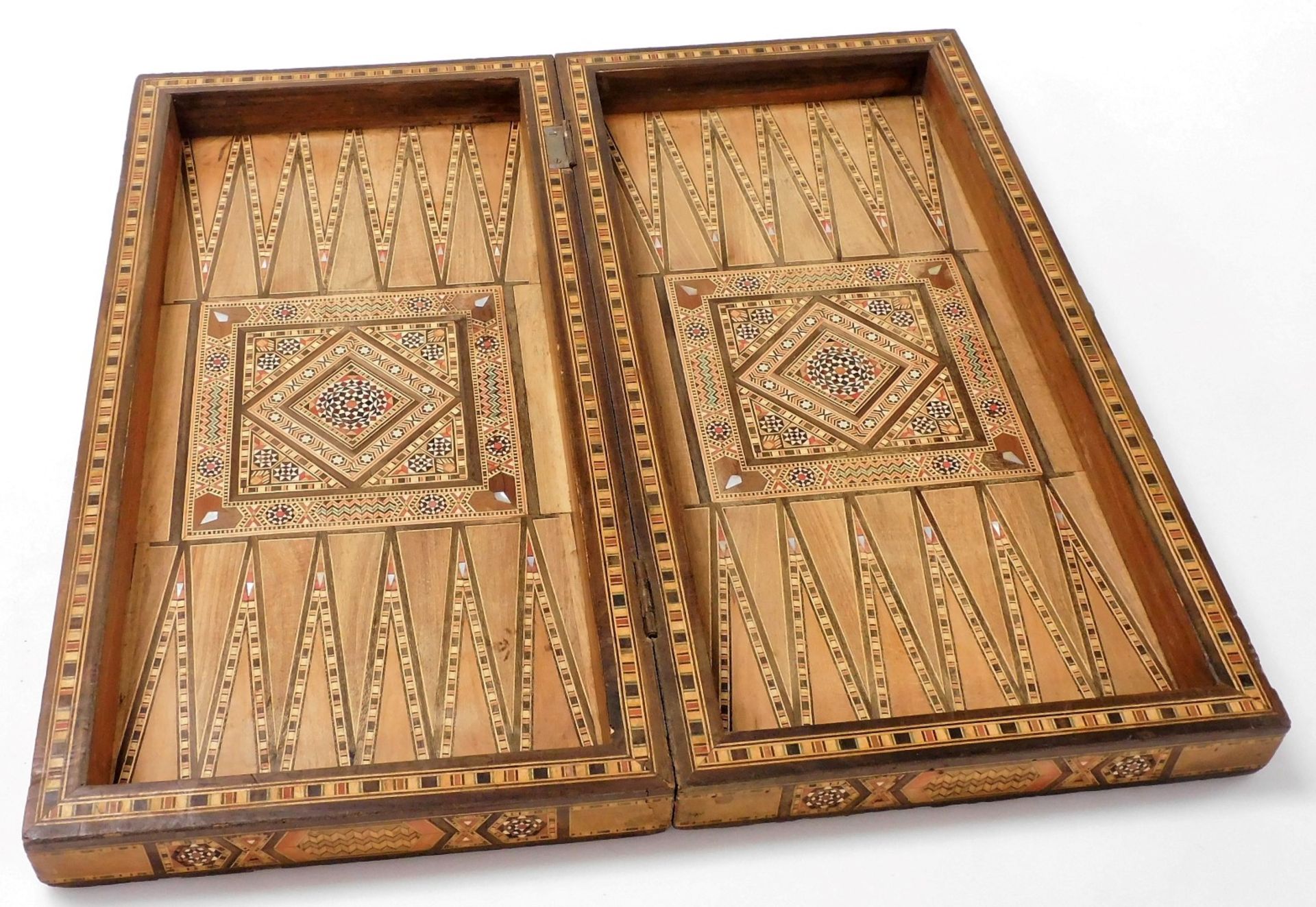 A Moorish inlaid backgammon box, profusely inlaid with finely detailed parquetry panelling and with - Image 2 of 5