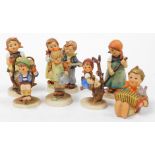 Eight Goebel Hummel porcelain figures, comprising Lets Sing, Sister, Little Gardener, Apple Tree Gir