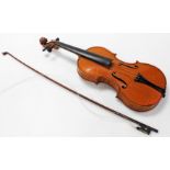 A violin, with a two piece back, bearing label marked Ch. JB Collin Mezin, Luthier a Paris, together