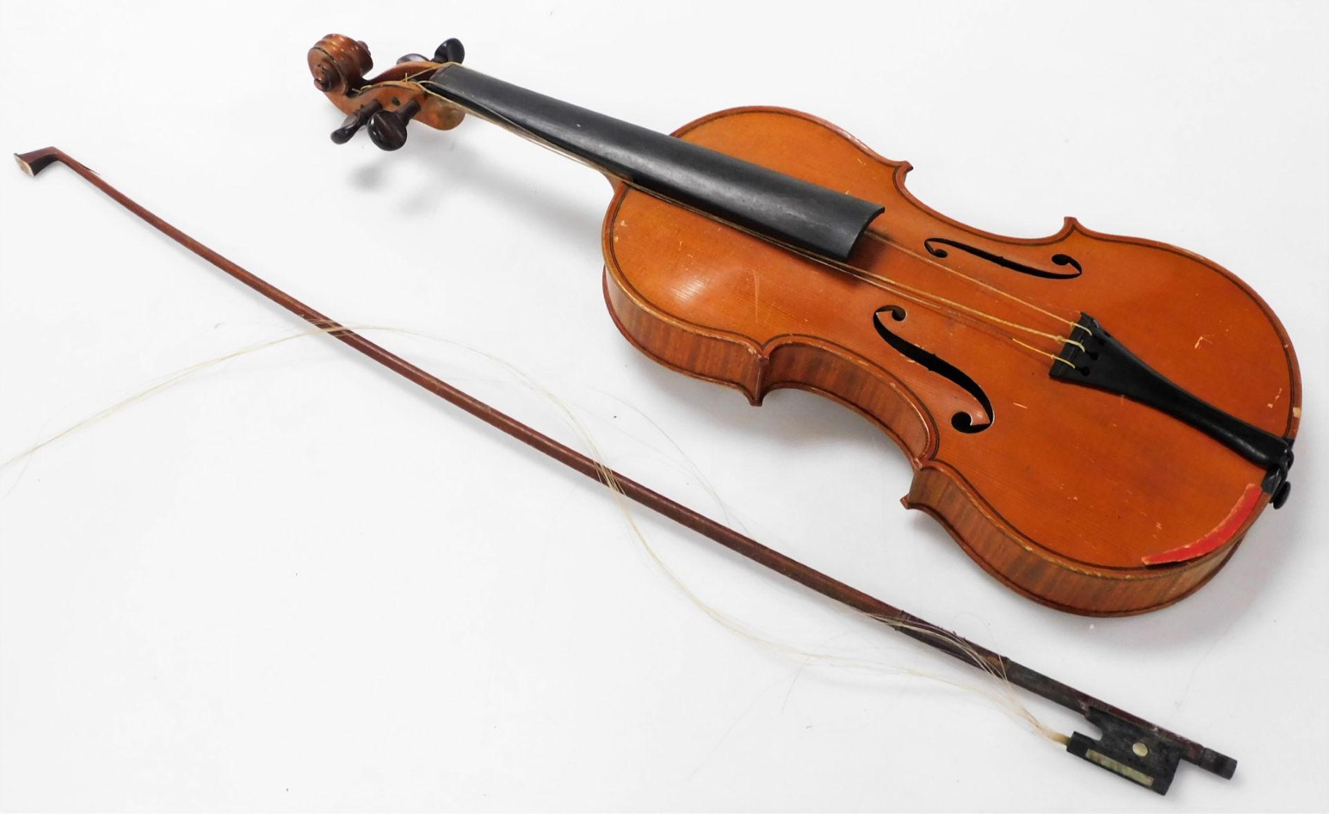 A violin, with a two piece back, bearing label marked Ch. JB Collin Mezin, Luthier a Paris, together