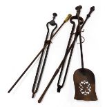 Assorted Victorian and later fire irons, with various handles, comprising two pokers, two coal tongs