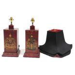 A pair of Chinese simulated red lacquer square section table lamps, decorated with emperor figures,