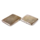 Two George V silver cigarette cases, each with engine turned decoration, Walker and Hall, Chester 19