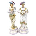 A pair of late 19thC French bisque porcelain figures, modelled as a gallant and lady in 16thC costum