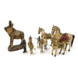 Three early 20thC Indian painted wooden carvings of horses, further wooden carving, and six painted