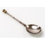 A silver spoon, with a fluted and bound shaft and thistle terminal, Sheffield 2009, 1.25oz.