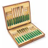 A set of twelve Edward VII dessert knives and forks, with electroplated blades and prongs, silver co