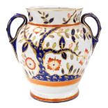 A large Victorian ironstone china two handled ovoid jar, lacking cover, painted in the Imari palette