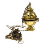 An early 20thC brass thurible, with chain suspension, 21cm high.