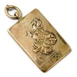 An Edward VII silver pendant, of rectangular form, for The National Sweet Pea Society, embossed to t