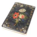 A Victorian painted papier mache blotter, decorated with flowers, 23cm high, 15.5cm wide.
