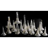 A collection of Victorian and later glass epergne trumpet vases, in varying sizes, including a pair
