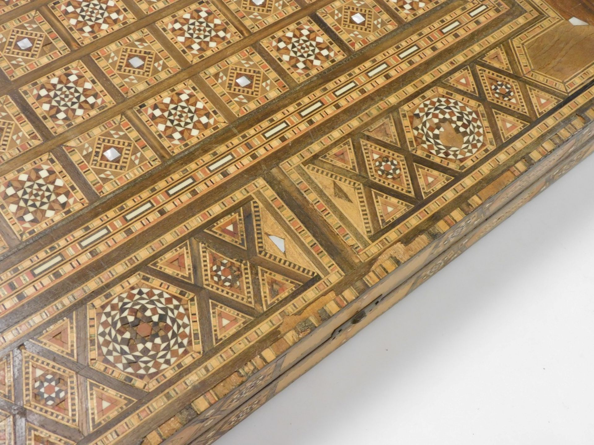 A Moorish inlaid backgammon box, profusely inlaid with finely detailed parquetry panelling and with - Image 5 of 5