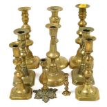 A group of 19thC brass candlesticks, pairs and singles. (a quantity)