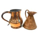 A 19thC copper two gallon flagon, 33cm high, and a smaller copper flagon, 31cm high. (AF)