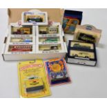 A group of boxed diecast cars, to include Matchbox Silver Jubilee bus, News of the World Vehicles, L