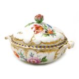 A 19thC Furstenberg porcelain ecuelle and cover, of lobed form, painted with sprays of flowers, gilt