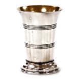 A Victorian silver jigger, with banded decoration to the body, raised on a stepped base, Sheffield 1