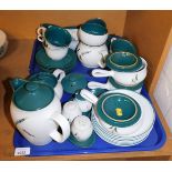 A Denby stoneware part tea and dinner service decorated in the Greenwheat pattern, to include teapot