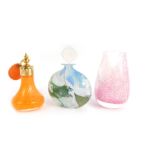 An iridescent mottled glass scent bottle, with clear stopper, 12cm high, a Caithness vase, and anoth