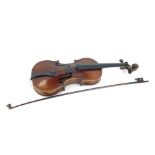 A two piece back violin and bow, 60cm long. (AF)