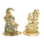 A pair of Victorian brass Punch and Judy door stops, 30cm high.