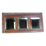 A late 19thC mahogany mirror, of three rectangular mirror inset panels, with reeded top, 46cm wide,