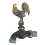 A bronze effect brass tap decorated with a cockerel stamped Flora Fauna, registered mark, 17cm high,
