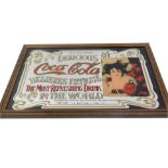 A Deliciously Coca Cola advertising wall mirror, 20cm x 33cm.