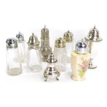 A group of silver plated sugar shakers, circa 1920s and later, comprising pressed and cut glass, a S