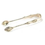 A pair of Victorian Mappin and Webb silver sugar tongs, with shell pattern, Sheffield 1893, 0.61oz.