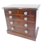 A Victorian mahogany apprentice chest , of two short over three long drawers, with applied glass