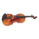 A two piece back violin, bears label for Jan Podesva, houslar, v Brne, 59cm long.
