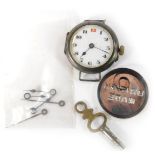 A silver cased wristwatch head and various watch parts, the watch head with white enamel numeric dia