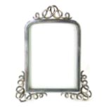 An Asprey silver plated photograph frame, with scroll top and sides, scroll easel back, oblong frame