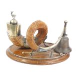 An early 20thC table top snuff mull, with a scrolled ram's horn, with silver plated mounts, presenta