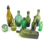 A collection of 19thC and later green glass bottles, comprising Low Sun and Cobbald Limited of Stamf