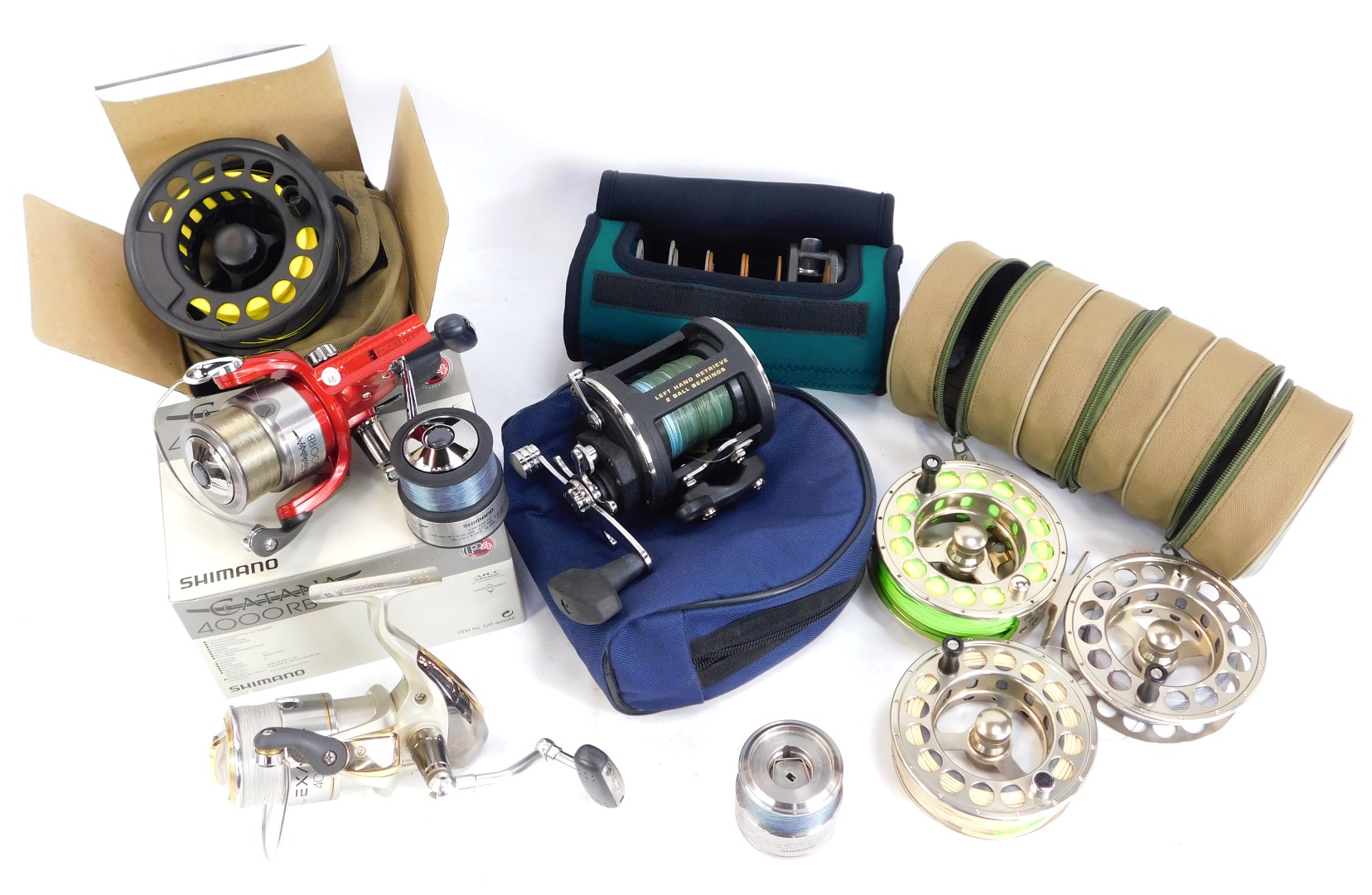 A group of fishing reels,