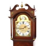 Charles E Short of Brighton. A 20thC mahogany long case clock, break arch dial with brass cherub spa