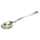 An Isle of Mull Silver Company spoon, with a shaped top depicting face, white metal, hallmarks rubbe