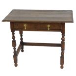An 18thC oak side table, with moulded top, frieze drawer, and baluster turned legs, 73cm high, 97cm