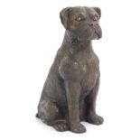 A figure of a seated Boxer Dog, 17cm high.