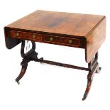 A 19thC rosewood sofa table, with satinwood banding, two frieze drawers and opposing dummies, on car