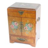 A Korean elm and painted tansu cabinet, with brass carrying handles, the hinged lid painted with ros