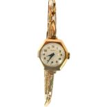 An Audax 9ct gold cased lady's wristwatch, with an octagonal watch head, with a cream coloured dial
